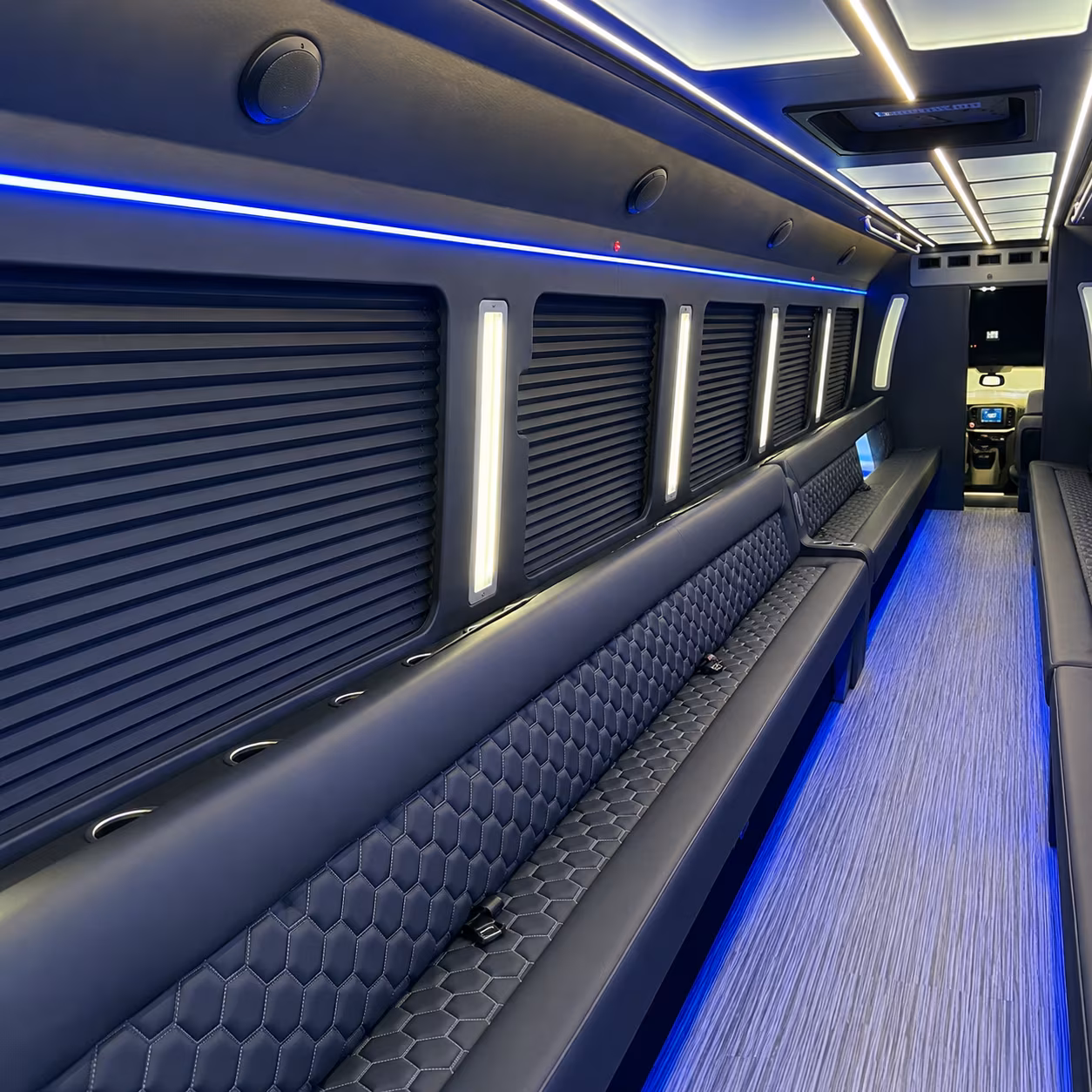 Passenger seating aboard a party bus rental serving Syracuse
